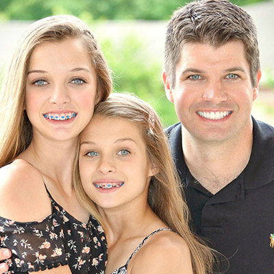 Dr. Wigal and his daughters