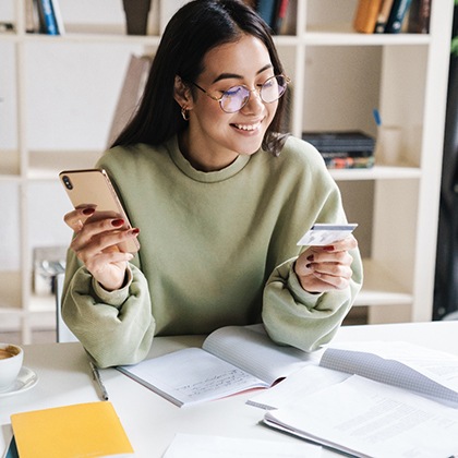 Woman holding a credit card