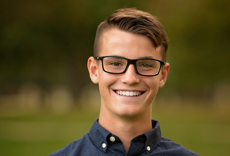 Teen boy with healthy straight smile