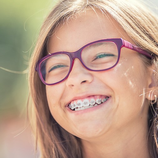 Mt. Vernon child showing improved smile after crossbite treatment