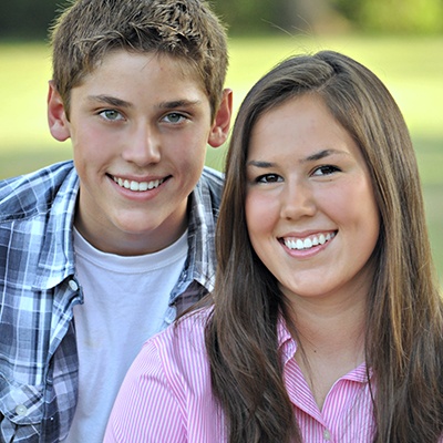 Young boy and girl with straight teeth