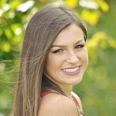Young woman with perfectly straight teeth
