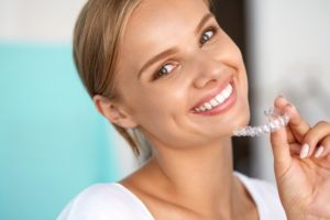 Woman with clear aligner.