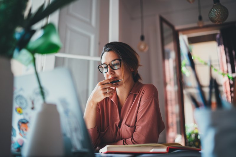 Woman researching mail order braces online