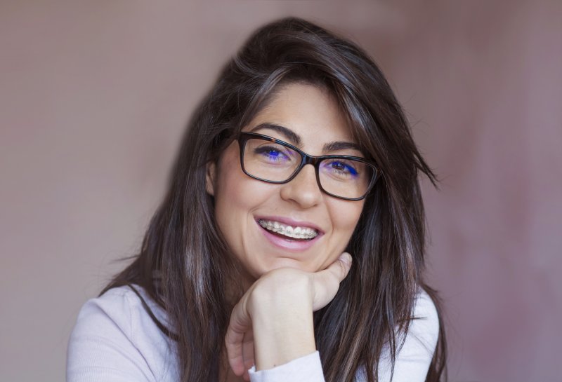 Woman with traditional braces in Newark