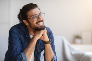 Adult man smiling with traditional braces